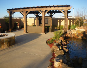 Concrete Floors On An Outdoor Patio With Koi Pond And Pagoda